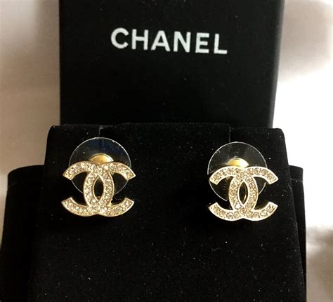 chanel logo stud earrings fake|chanel logo earrings white gold.